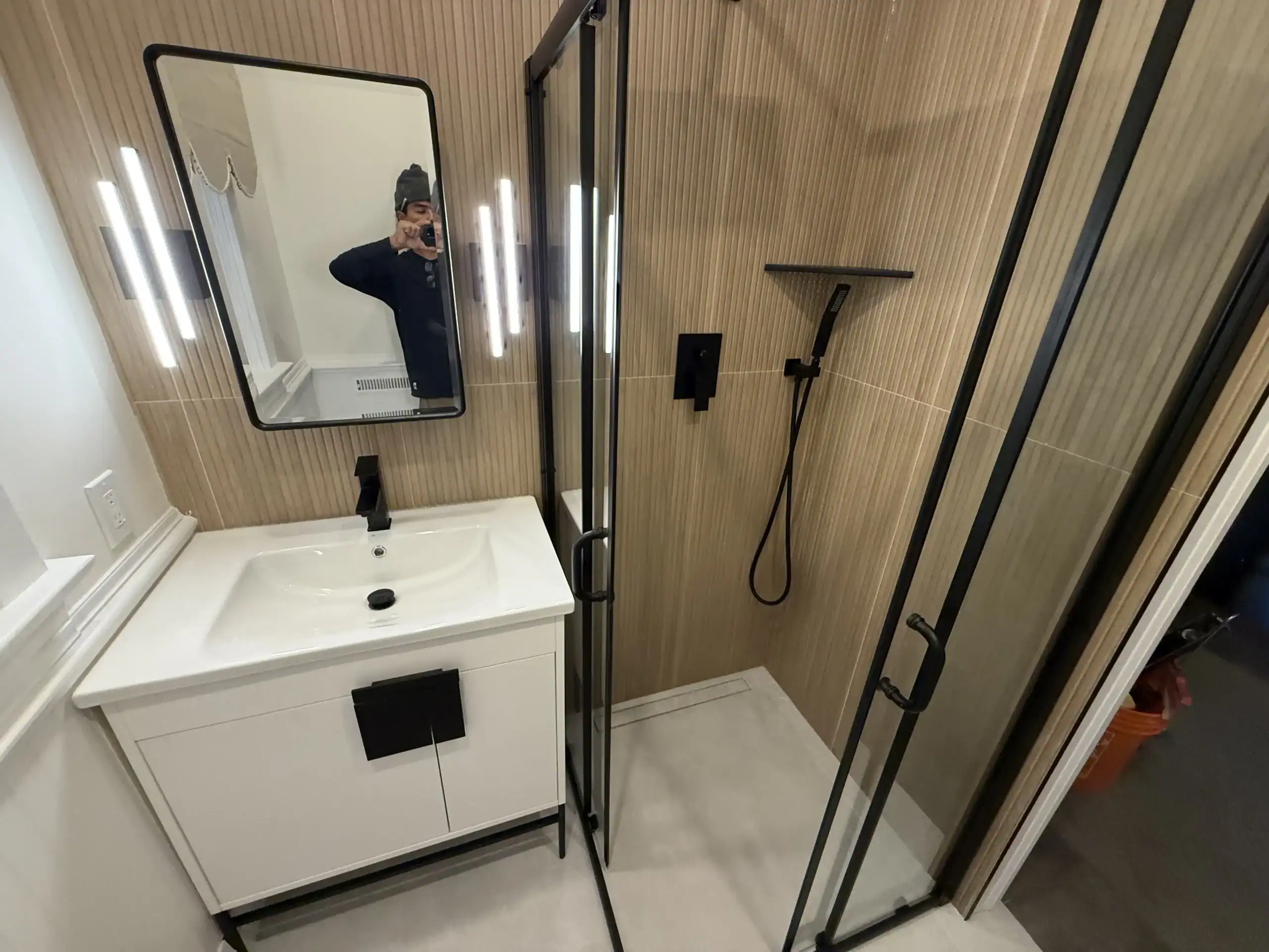 Modern bathroom shower and vanity in Toronto.